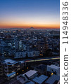 A city stained by the setting sun 114948336