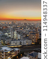 A city stained by the setting sun 114948337