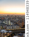 A city stained by the setting sun 114948339