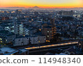 A city stained by the setting sun 114948340
