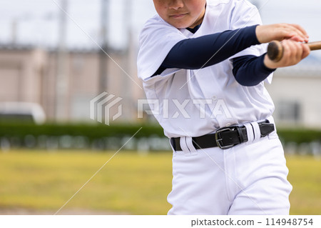 Baseball boy practicing his swing Baseball boy practicing his swing 114948754