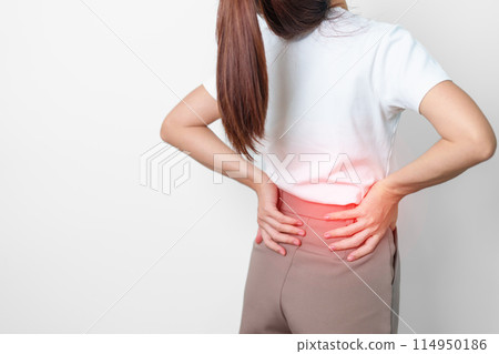 adult female with muscle pain on gray background. Elderly woman having back body ache due to Piriformis Syndrome, Low Back Pain and Spinal Compression. Office syndrome and medical concept 114950186