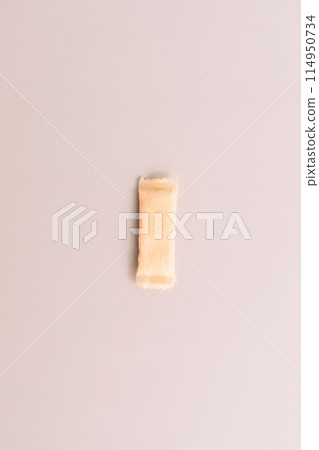 One bag of fruit flavored snus on a light background One bag of fruit flavored snus on a light background 114950734
