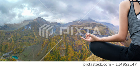 Young woman practicing yoga in the nature Young woman practicing yoga in the nature 114952147
