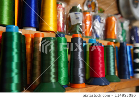 A lot of embroidery threads lined up 114953080