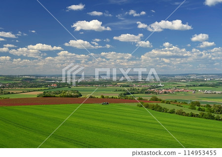 Beautiful landscape in the Czech Republic. Green nature with blue sky and sun. Beautiful landscape in the Czech Republic. Green nature with blue sky and sun. 114953455