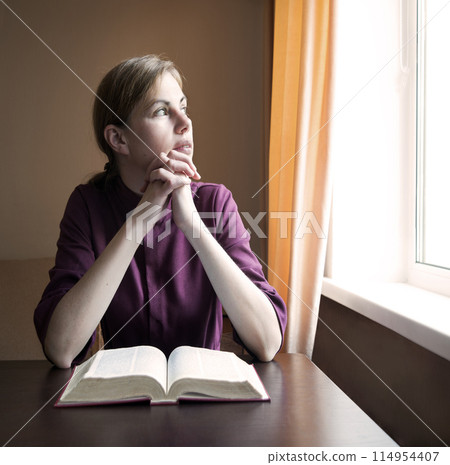 Young girl with old book 114954407