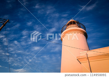 Twilight sky and white lighthouse Twilight sky and white lighthouse 114958091
