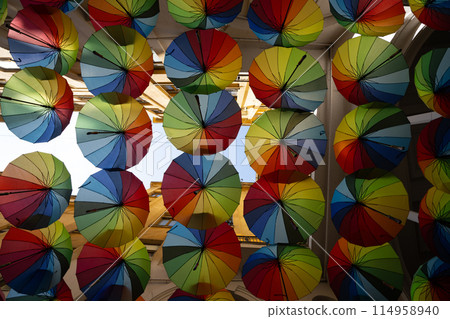 Multicolored umbrellas ceiling in Bucharest, Romania 114958940