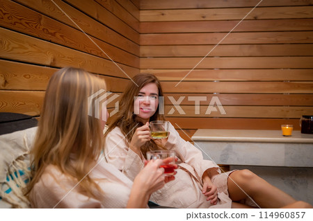 Relaxing in the sauna Relaxing in the sauna 114960857