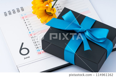 Calendar and presents. Father's Day image 114961162