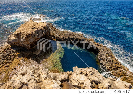 Blue Hole Viewpoint Dwejra Bay, Gozo island Malta. Blue Hole Viewpoint Dwejra Bay, Gozo island Malta. 114961617