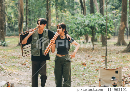 Asian couple sweet in tent inside on they camping trip, traveller relax and sleep togather in out door and camping trip 114963191