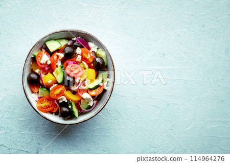 Greek salad. Fresh tomato, cucumber, bell pepper, Feta cheese, onion Greek salad. Fresh tomato, cucumber, bell pepper, Feta cheese, onion 114964276