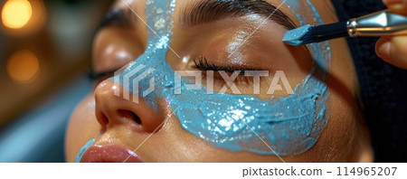 Girl with moisturizing mask in beauty salon 114965207