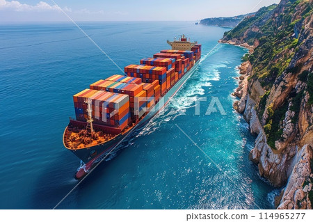 Marine grandiosity: a container ship with cargo fits perfectly into the bright blue picture of the ocean under a clear blue sky 114965277
