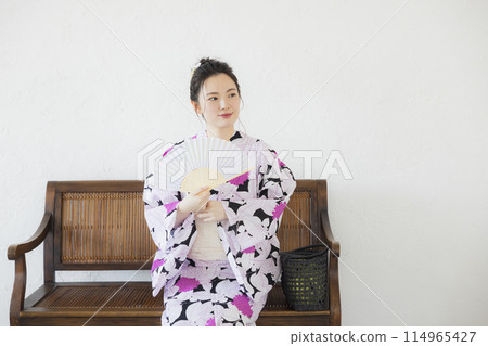 A woman in a yukata A woman in a yukata 114965427