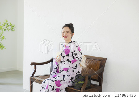 A woman in a yukata A woman in a yukata 114965439