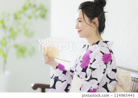 A woman in a yukata A woman in a yukata 114965445