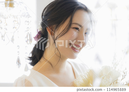 Young woman in a wedding dress Young woman in a wedding dress 114965889