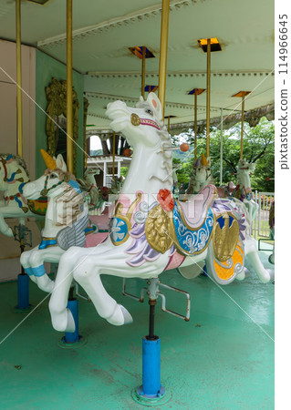 Showa retro merry-go-round in an amusement park 114966645