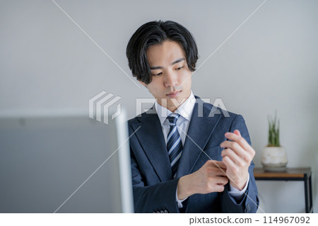 A man wearing a suit A man wearing a suit 114967092