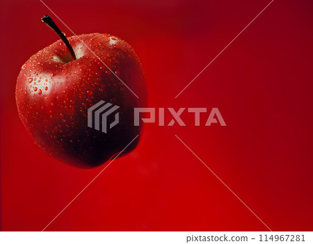 Red background and fresh apples 114967281