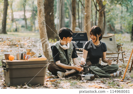 Asian couple sweet in tent inside on they camping trip, traveller relax and sleep togather in out door and camping trip 114968081