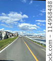 A highway stretching into the blue sky 114968488