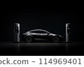 Black electric car with a charging station in the dark 114969401