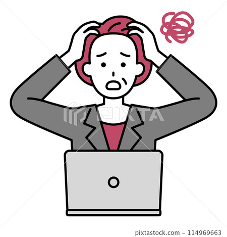 A middle-aged woman in a suit working on a laptop computer looking confused 114969663