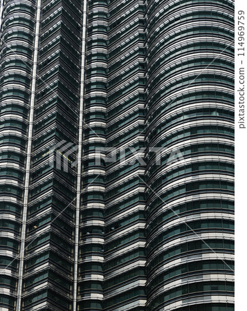 May 25, 2024. Kuala Lumpur, Malaysia. Petronas skyscrapers. Modern construction of Twin towers in center. May 25, 2024. Kuala Lumpur, Malaysia. Petronas skyscrapers. Modern construction of Twin towers in center. 114969759
