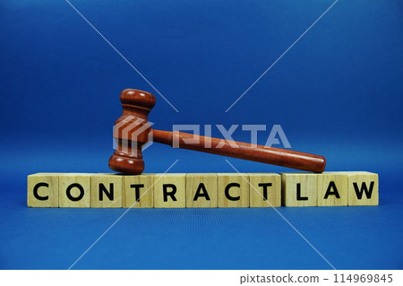 Contract Law alphabet letters with wooden blocks alphabet letters and Gavel on blue background Contract Law alphabet letters with wooden blocks alphabet letters and Gavel on blue background 114969845