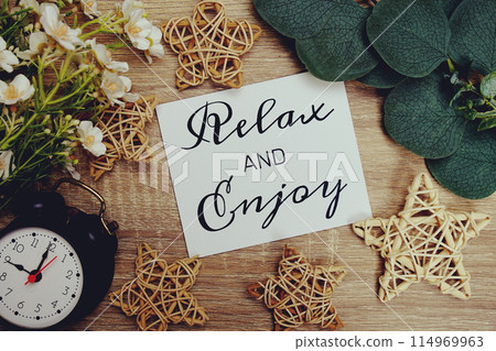 Relax and enjoy The phrase Motivational Words Quotes Concept Relax and enjoy The phrase Motivational Words Quotes Concept 114969963