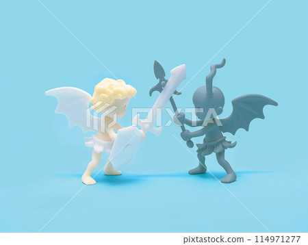 Image of a figurine of an angel and a devil fighting 114971277