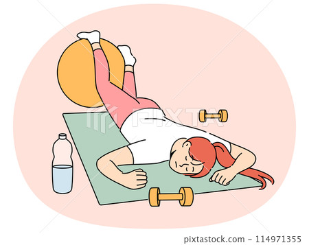 Exhausted woman in fitness room fell asleep on sports yoga mat and needs to rest after workout Exhausted woman in fitness room fell asleep on sports yoga mat and needs to rest after workout 114971355