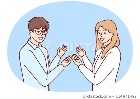 Couple man and woman in business clothes make inviting gesture with hands urging you to visit sale Couple man and woman in business clothes make inviting gesture with hands urging you to visit sale 114971452