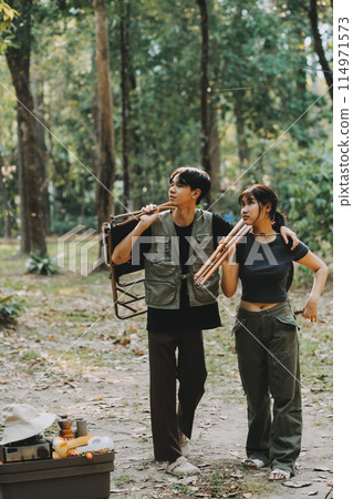 Asian couple sweet in tent inside on they camping trip, traveller relax and sleep togather in out door and camping trip 114971573