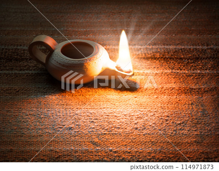 Ancient lamp shines in the dark Ancient lamp shines in the dark 114971873
