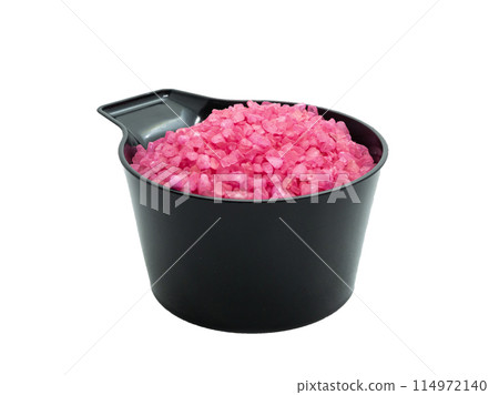 pink bath salt in a black cup isolated. spa concept 114972140