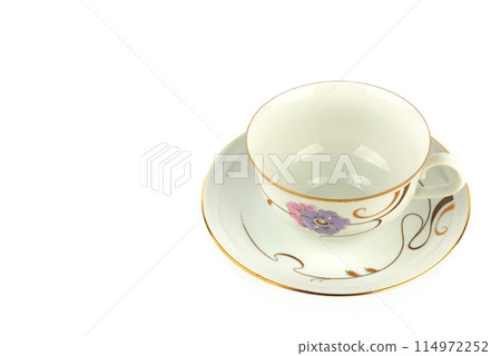 Vintage porcelain cup and saucer isolated on white. There is free space for text. Vintage porcelain cup and saucer isolated on white. There is free space for text. 114972252