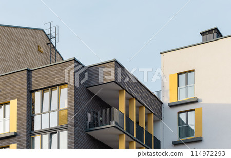Architectural housing in city apartment, modern urban residential exterior. Window sky balcony 114972293