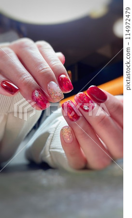 red manicure red manicure 114972479