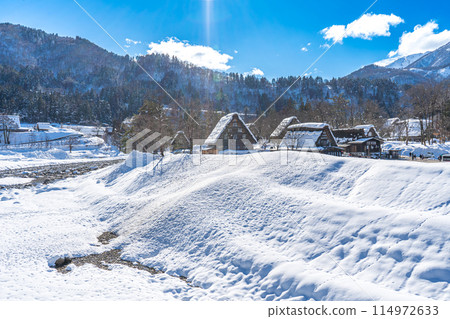 Snow scene in Shirakawa-go, Gifu Prefecture, Japan, famous for its Gassho-style houses 114972633