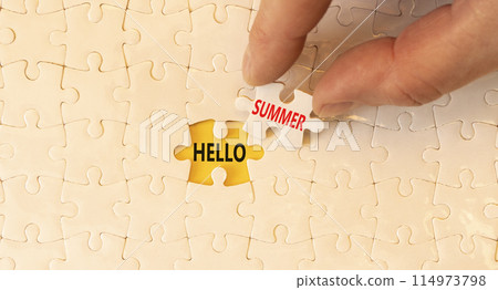 Hello summer symbol. Concept words Hello summer on beautiful white paper puzzles. Beautiful yellow background. Businessman hand. Business lifestyle Hello summer concept. Copy space. 114973798
