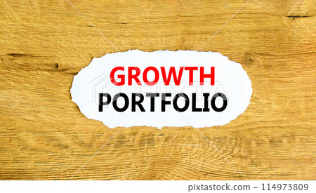 Growth portfolio symbol. Concept words Growth portfolio on beautiful white paper. Beautiful wooden wall background. Business Growth portfolio concept. Copy space. 114973809