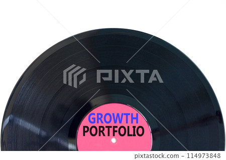Growth portfolio symbol. Concept words Growth portfolio on beautiful purple black vinyl disk. Beautiful white paper background. Business Growth portfolio concept. Copy space. 114973848
