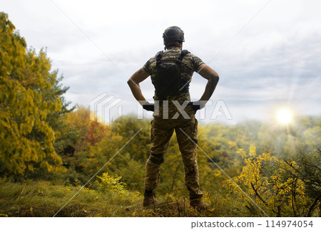 Sad soldier look to the sky Sad soldier look to the sky 114974054