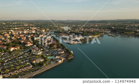 Aerial view of the city of Peschiera del Garda, Italy. Tourism and travel concept. Copy space 114974948