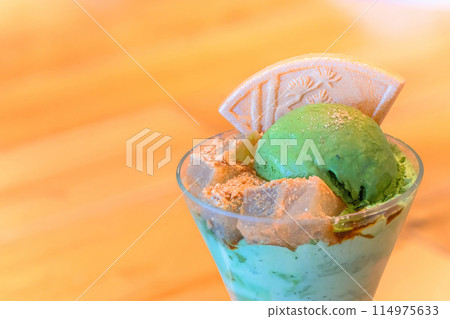 [Domestic] A Japanese-style dessert, matcha ice cream parfait, garnished with agar jelly and dried sweets. 114975633